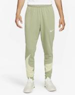  Pantaloni tuta Pants UOMO Nike Sportswear Dri-Fit Taper Energy Verde 